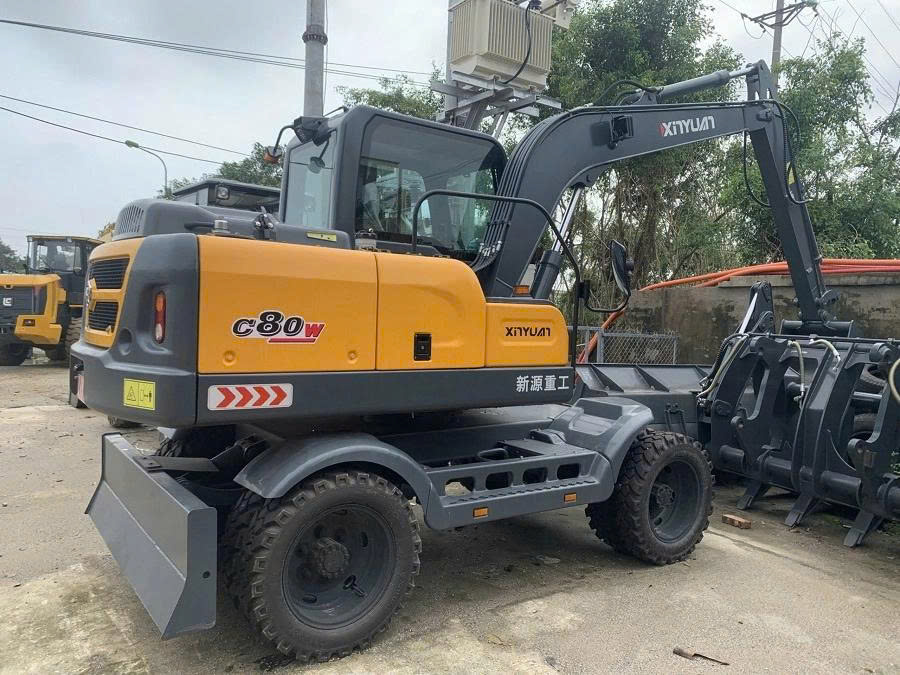 Xúc đào bánh lốp Xinuyan XYC80WYT gầu 0.3 khối - Cty Hải Âu